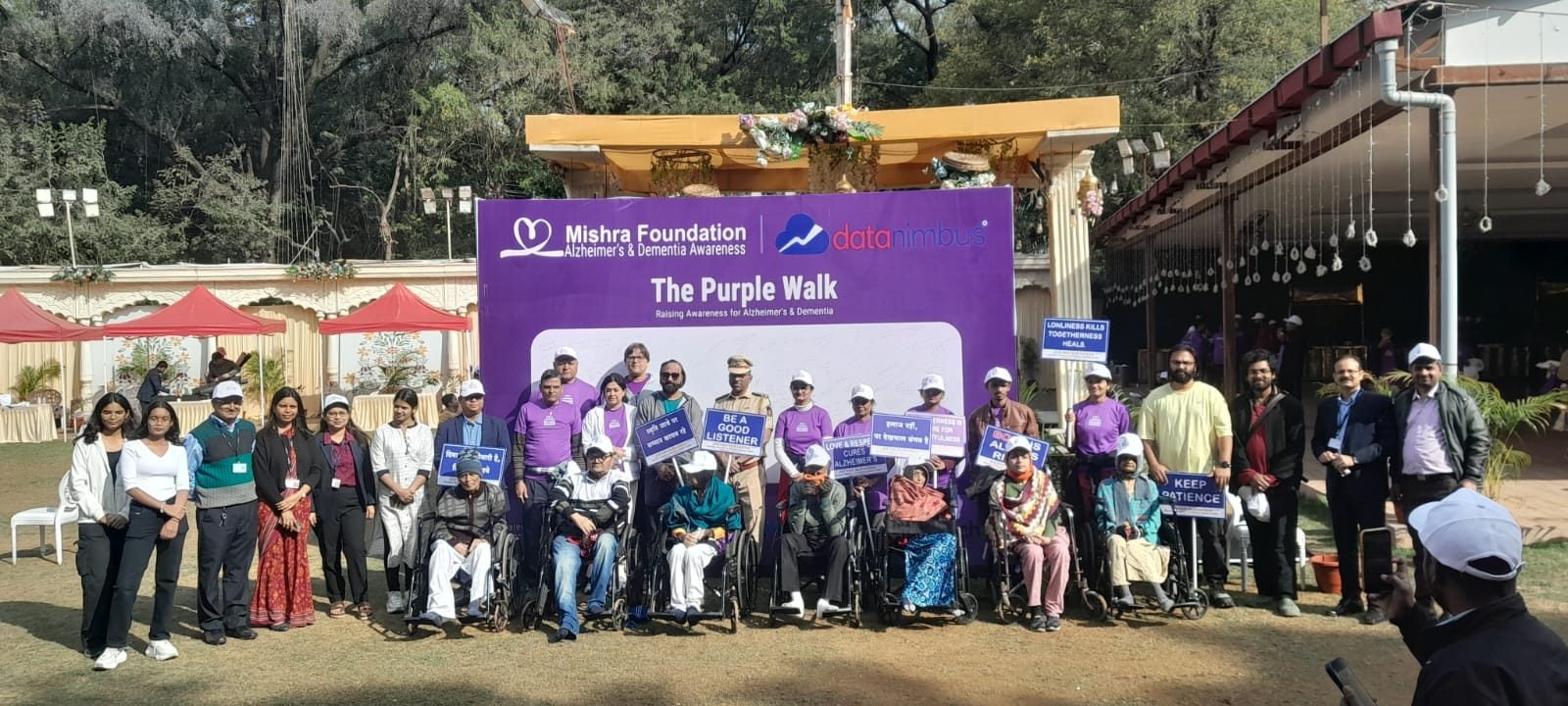 Large group photo of Mishra Foundation community at a support circle gathering